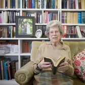 Ann Mitchell with her wartime diary at her home in Inverleith, Edinburgh, in 2014. Picture: Jane Barlow