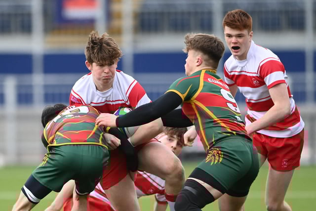 Lorreto and Queen Victoria School compete for the ball