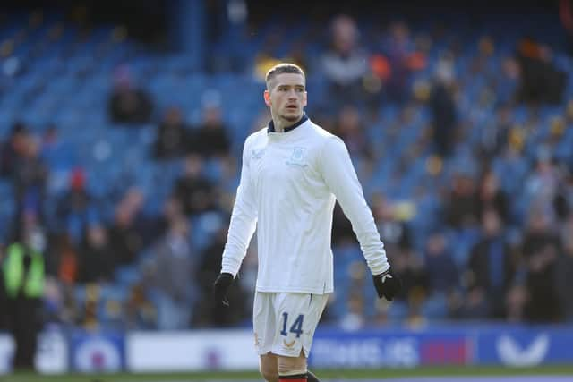 Ryan Kent wearing Rangers' white 150th annivesary kit during the warm-up against Aberdeen.  (Photo by Craig Williamson / SNS Group)