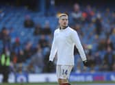 Ryan Kent wearing Rangers' white 150th annivesary kit during the warm-up against Aberdeen.  (Photo by Craig Williamson / SNS Group)