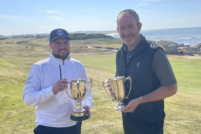 Graham Fox, right, shows off the Northern Open trophy after his win at Moray Golf Club in Lossiemouth, where Ryan Bain claimed the Bookless Trophy as leading amateur. Picture: PGA in Scotland