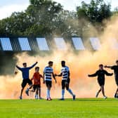 Dundee United fans invade the pitch after their side's shoot-out success over Ayr in the clubs' Premier Sports Cup last 16 tie at Somerset Park. (Photo by Craig Williamson / SNS Group)