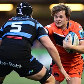Chris Dean of Edinburgh Rugby under pressure from Rory Thornton of Cardiff Rugby. Photo by Ashley Crowden/INPHO/Shutterstock (13573832al)