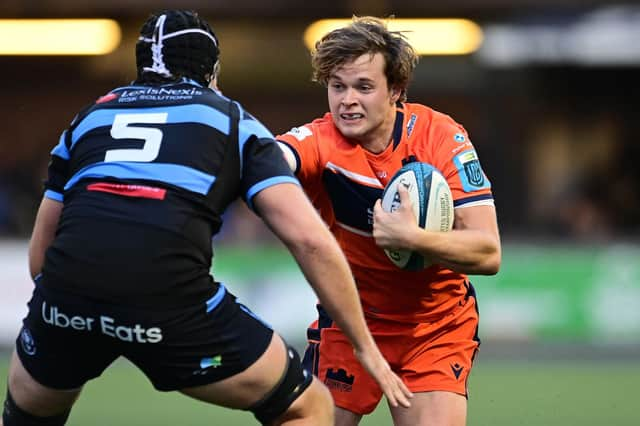 Chris Dean of Edinburgh Rugby under pressure from Rory Thornton of Cardiff Rugby. Photo by Ashley Crowden/INPHO/Shutterstock (13573832al)