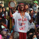 People take part in the 'Aurat March' or women's march, an annual socio-political demonstration held to observe International Women's Day, in Karachi, Pakistan.