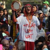 People take part in the 'Aurat March' or women's march, an annual socio-political demonstration held to observe International Women's Day, in Karachi, Pakistan.