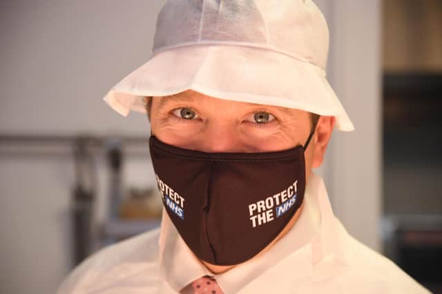 Health Secretary Matt Hancock, wearing a Protect the NHS branded face mask, during a visit to kitchens at the Royal Berkshire Hospital in Reading. Picture: Jeremy Selwyn/Evening Standard/PA Wire