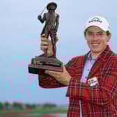Wearing the winner's Heritage Plaid tartan jacket, Matt Fitzpatrick shows off the RBC Heritage trophy at Harbour Town Golf Links in Hilton Head Island, South Carolina. Picture: Andrew Redington/Getty Images.