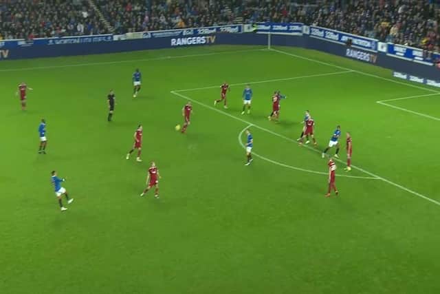 In this image you can see Bates has turned away from the ball to the point his number is facing the pass from Tavernier as he grapples with Sakala.