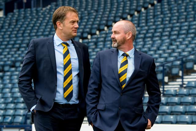 Ian Maxwell, left, alongside Scotland manager Steve Clarke.