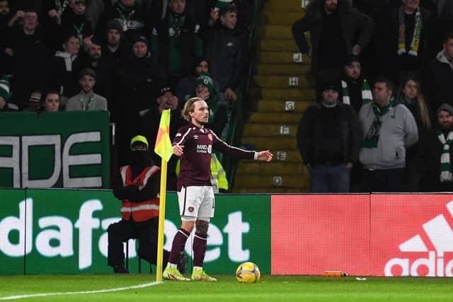 Hearts Barrie McKay was struggling to take corner kicks due to objects being thrown from Celtic fans. (Photo by Craig Foy / SNS Group)