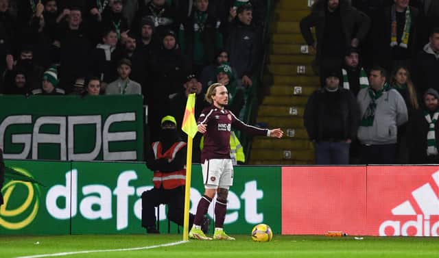 Hearts Barrie McKay was struggling to take corner kicks due to objects being thrown from Celtic fans. (Photo by Craig Foy / SNS Group)