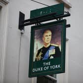 A portrait of Prince Andrew outside The Duke of York pub in London. Picture: Hollie Adams/Getty Images