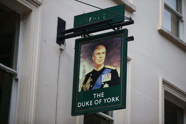 A portrait of Prince Andrew outside The Duke of York pub in London. Picture: Hollie Adams/Getty Images