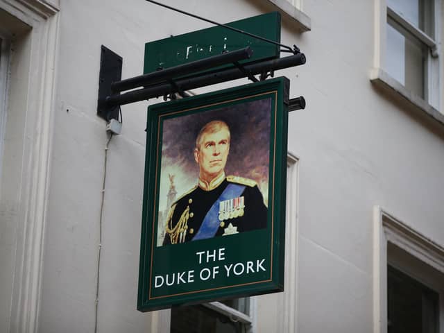 A portrait of Prince Andrew outside The Duke of York pub in London. Picture: Hollie Adams/Getty Images