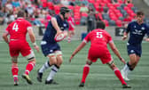 Max Williamson gets his hands on the ball against Canada.