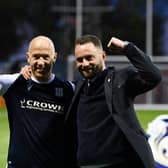 Dundee skipper Charlie Adam and manager James McPake embrace after the Premiership play-off win over Kilmarnock  (Photo by Rob Casey / SNS Group)