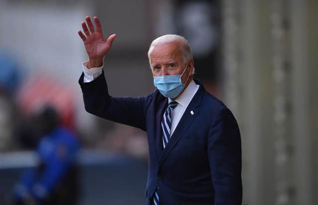 US President-elect Joe Biden waves after a speech in Wilmington, Delaware, in which he said he had told several world leaders that "America is back" after his defeat of Donald Trump (Picture: Angela Weiss/AFP via Getty Images)