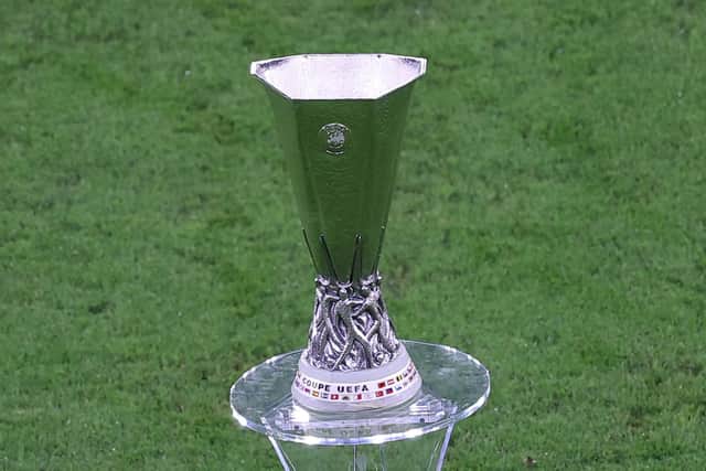 The Europa League trophy is the prize both sides are competing for tonight (Photo by LASZLO SZIRTESI/POOL/AFP via Getty Images)