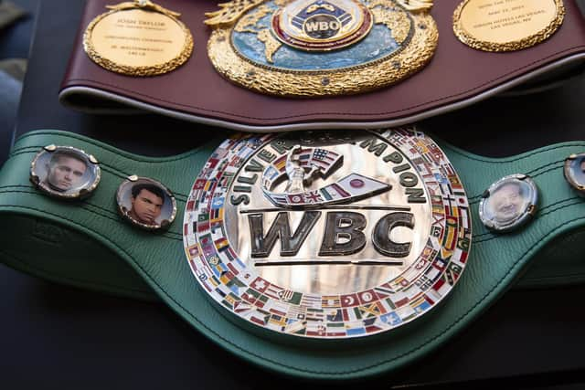 Scottish undisputed Super-Lightweight World Champion Josh Taylor shows off his belts at German Donner Kebab on June 07, 2021, in Glasgow, Scotland. (Photo by Craig Foy / SNS Group)