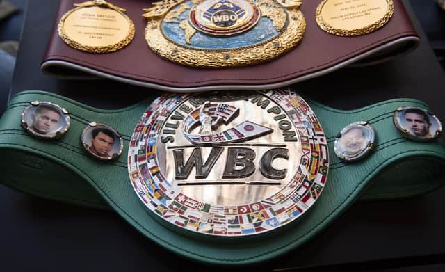 Scottish undisputed Super-Lightweight World Champion Josh Taylor shows off his belts at German Donner Kebab on June 07, 2021, in Glasgow, Scotland. (Photo by Craig Foy / SNS Group)