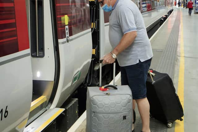A passenger wearing a face mask on a LNER train.