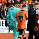 Dundee United manager Tam Courts (left) with Jeando Fuchs, who is playing well under the manager's stewardship.