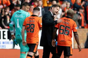 Dundee United manager Tam Courts (left) with Jeando Fuchs, who is playing well under the manager's stewardship.