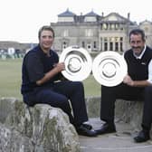 Daniel and Sam Torrance show off their trophies after winning the team competition in the 2003 Alfred Dunhill Links Championship at St Andrews. Picture: Andrew Redington/Getty Images.