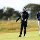 Ewen Ferguson, left, and Bob MacIntyre share a laugh during a practice round ahead of the Alfred Dunhill Links Championship in September. Picture: Richard Heathcote/Getty Images.