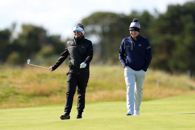 Ewen Ferguson, left, and Bob MacIntyre share a laugh during a practice round ahead of the Alfred Dunhill Links Championship in September. Picture: Richard Heathcote/Getty Images.