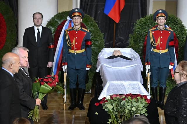 US ambassador to Russia John Joseph Sullivan, second left, walks to the coffin of former Soviet President Mikhail Gorbachev