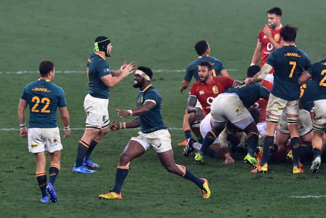 Siya Kolisi of South Africa celebrates with teammate Morne Steyn after winning the Test Series against the Lions. Picture: David Rogers/Getty Images