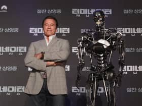 'The Terminator' (left) who was played on film by Arnold Arnold Schwarzenegger. Photo: Chung Sung-Jun/Getty Images.