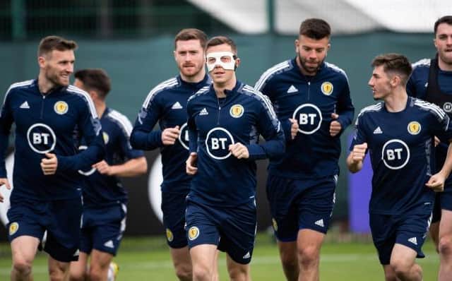 Callum McGregor (centre) with Billy Gilmour (right) during a Scotland training session at Oriam in Edinburgh on Sunday ahead of the World Cup play-off semi-final against Ukraine at Hampden on Wednesday. (Photo by Paul Devlin / SNS Group)