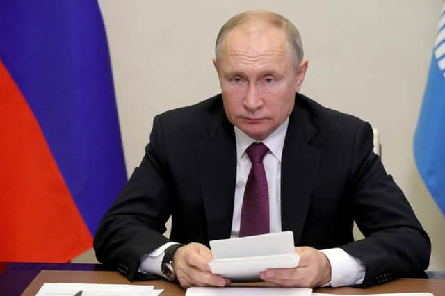 Vladimir Putin's regime has annexed part of a neighbouring country, Ukraine, is widely blamed for the fatal poisoning of a British woman, Dawn Sturgess, in a botched assassination attempt in Salisbury and is blamed for cyber attacks and election interference in democratic countries (Picture: Mikhail Klimentyev, Sputnik, Kremlin pool photo via AP)