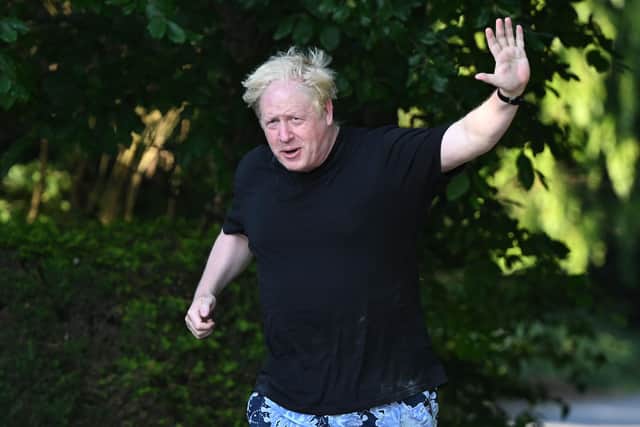 Former prime minister Boris Johnson is seen on his morning run in Brightwell-cum-Sotwell, England. Picture: Leon Neal/Getty Images