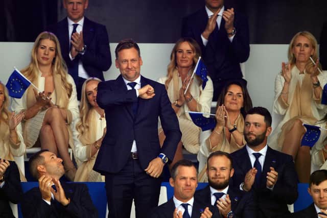 Ian Poulter acknowledges the crowd during the opening ceremony. Picture: Mike Ehrmann/Getty Images.
