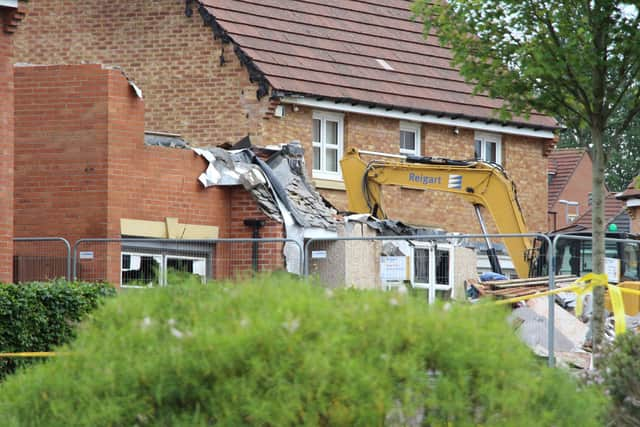 A body has been discovered after a fire partially destroyed a house in Airdrie, North Lanarkshire.