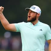 Tyrrell Hatton celebrates a birdie on the 18th green during day four of the BMW PGA Championship at Wentworth Club. Picture: Andrew Redington/Getty Images.