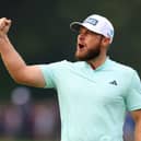 Tyrrell Hatton celebrates a birdie on the 18th green during day four of the BMW PGA Championship at Wentworth Club. Picture: Andrew Redington/Getty Images.