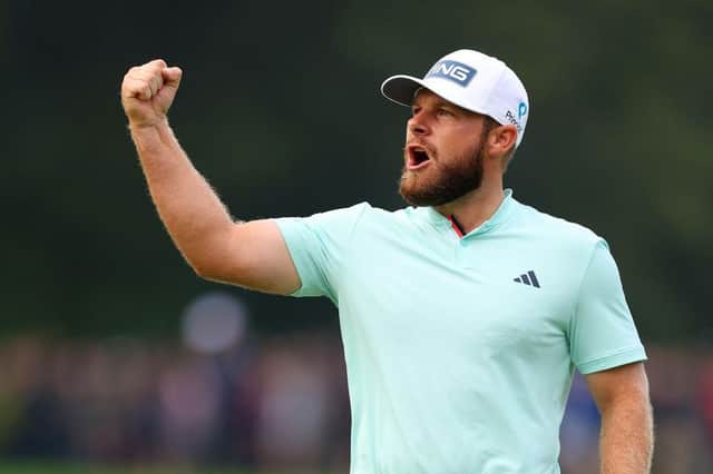 Tyrrell Hatton celebrates a birdie on the 18th green during day four of the BMW PGA Championship at Wentworth Club. Picture: Andrew Redington/Getty Images.