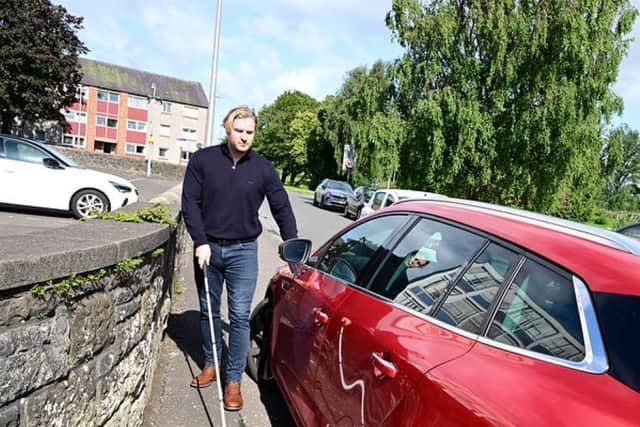 People with disabilities can find it difficult to safely get round vehicles parked on pavements