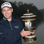 The smile on his face says it all as Russell Knox shows off the trophy after winning the 2015 WGC - HSBC Champions at the Sheshan International Golf Club in China. Picture: Ross Kinnaird/Getty Images.
