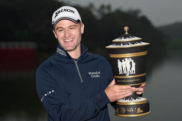 The smile on his face says it all as Russell Knox shows off the trophy after winning the 2015 WGC - HSBC Champions at the Sheshan International Golf Club in China. Picture: Ross Kinnaird/Getty Images.