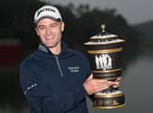 The smile on his face says it all as Russell Knox shows off the trophy after winning the 2015 WGC - HSBC Champions at the Sheshan International Golf Club in China. Picture: Ross Kinnaird/Getty Images.