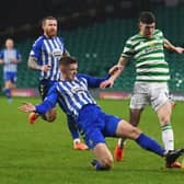 Celtic's Ryan Christie and Stuart Findlay in action during a Scottish Premiership match between Celtic and Kilmarnock at Celtic Park, on December 13, 2020, in Glasgow, Scotland. (Photo by Craig Foy / SNS Group)