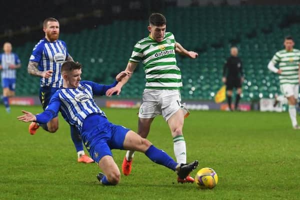 Celtic's Ryan Christie and Stuart Findlay in action during a Scottish Premiership match between Celtic and Kilmarnock at Celtic Park, on December 13, 2020, in Glasgow, Scotland. (Photo by Craig Foy / SNS Group)