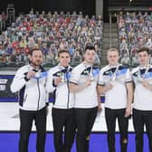 Scotland show off their silver medals after the final of the BKT Tires & OK Tire World Men's Curling Championship in Calgary. Picture: WCF/Jeffrey Au