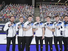 Scotland show off their silver medals after the final of the BKT Tires & OK Tire World Men's Curling Championship in Calgary. Picture: WCF/Jeffrey Au